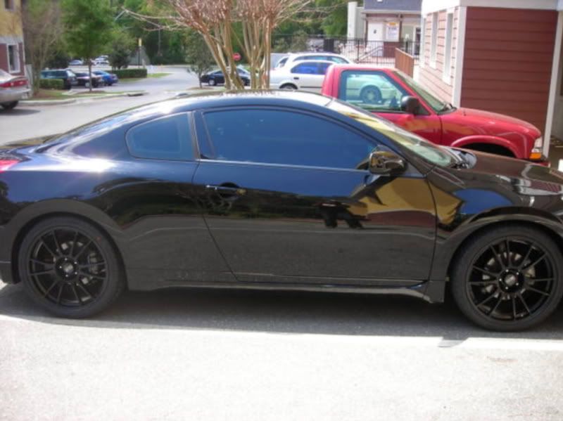 AND there is a coupe that is blacked out mostly