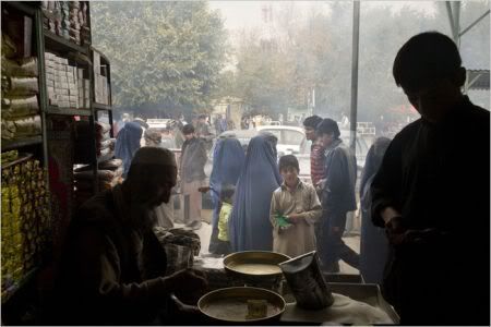 kabul university logo. In bazaars and university