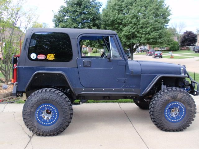 Rhino lining the exterior of jeep - JeepForum.com