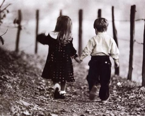 little girl and little boy walking while holding hands Pictures, Images and Photos