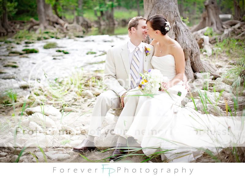 bride and groom portraits by a creek